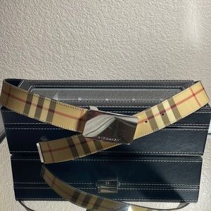 Used authentic Burberry unisex belt .